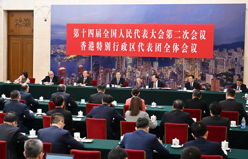 王沪宁丁薛祥分别参加全国人大会议一些代表团审议2